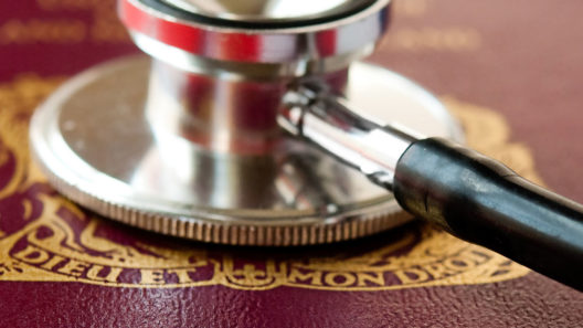 Passport and stethoscope