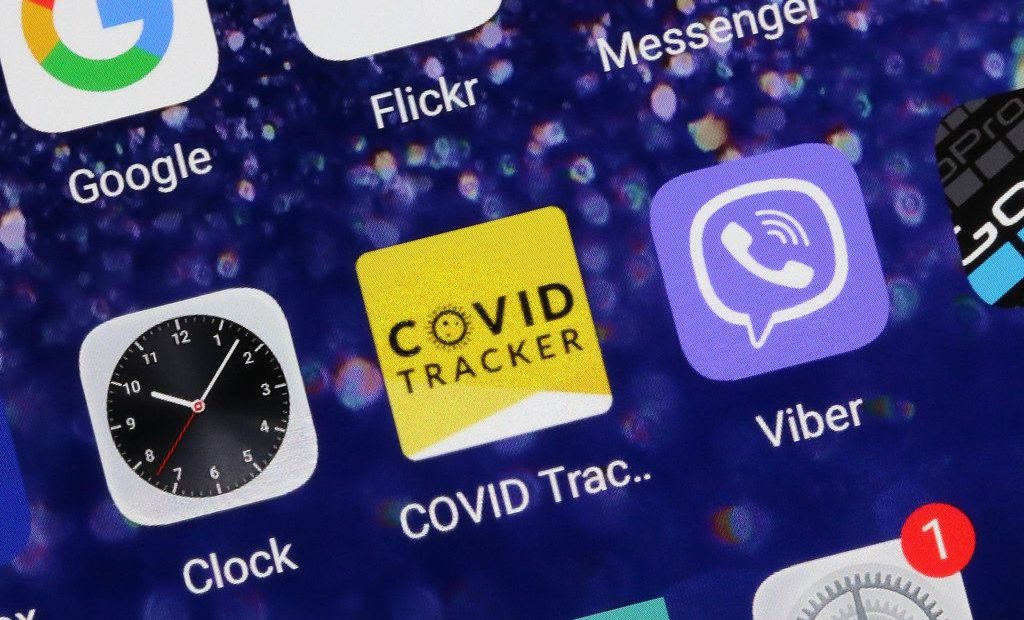 COVID tracker app on smartphone screen