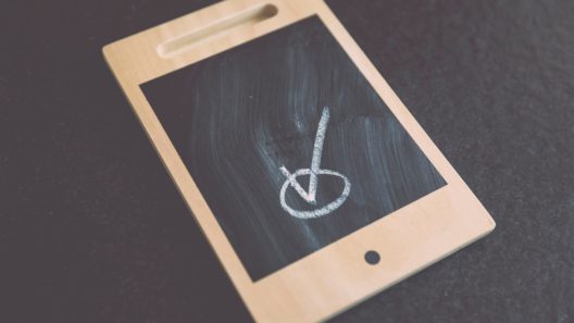 Wooden ipad with check mark