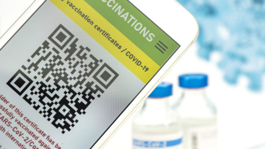 Closuep of a row of vials with COVID-19 coronavirus vaccine