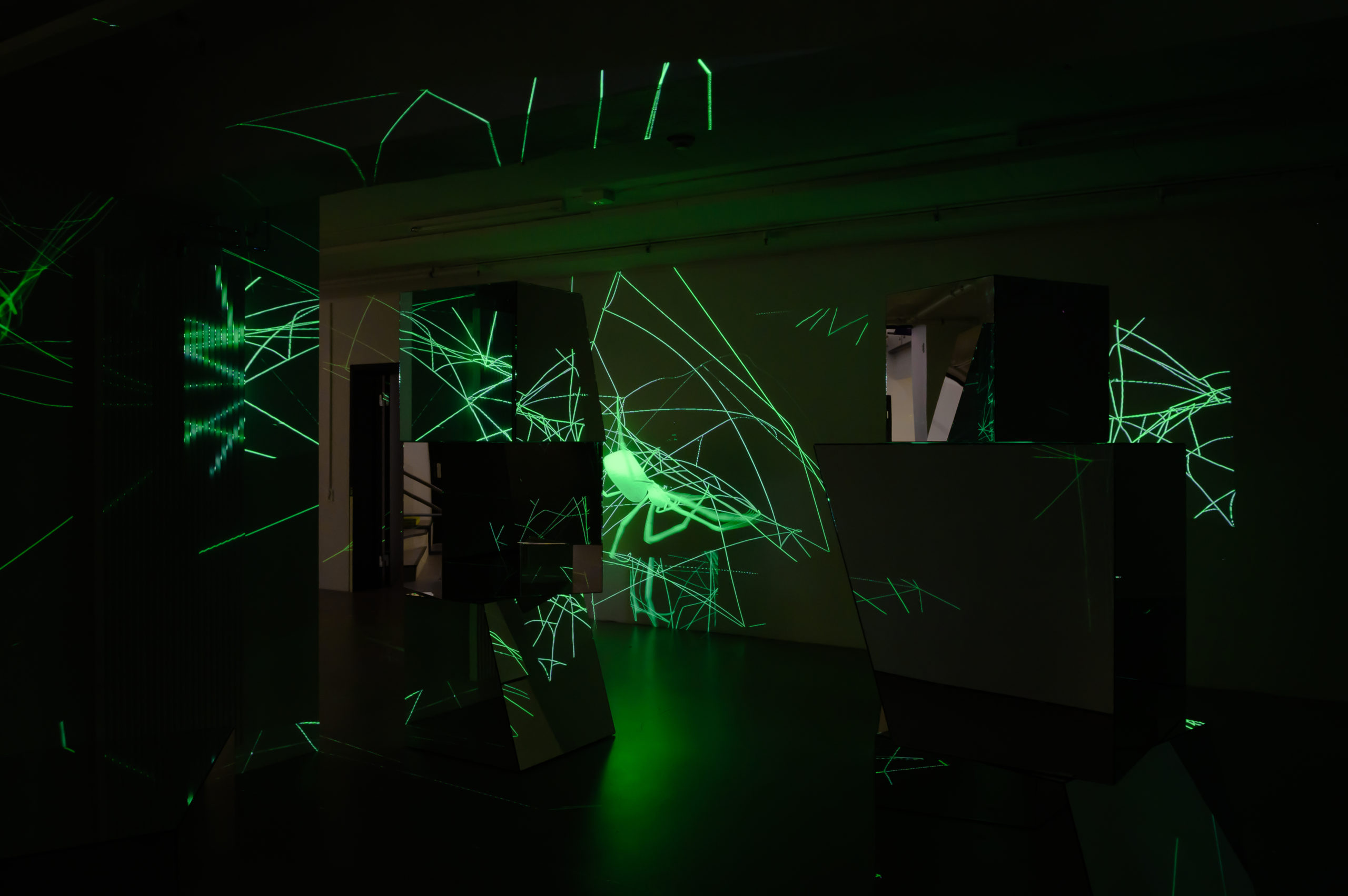 Ann Lislegaard, Spinning and Weaving Ada (2016), 3D animation, 12 mirror sculptures, each 70 x 70 x 80 cm. Courtesy the artist. Photo: Daniel Vincent Hansen. In the exhibition Unweaving the binary code at Kunsthall Trondheim as part of the 3rd Hannah Ryggen Triennale, 2022.