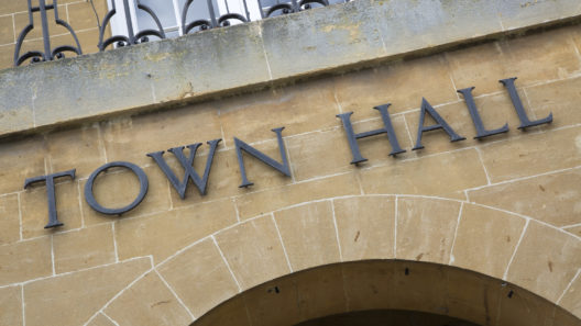 Town hall sign on a building facade