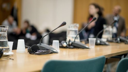 Microphones set up at a conference seminar